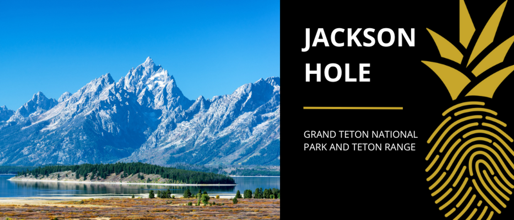 A view of Jackson Hole from above, with the Grand Teton National Park and Teton Range in the background