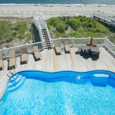 View of the oceanfront private pool from a Holden Beach vacation rental.