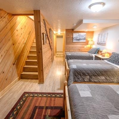 Cozy bedroom in a West Yellowstone vacation rental.