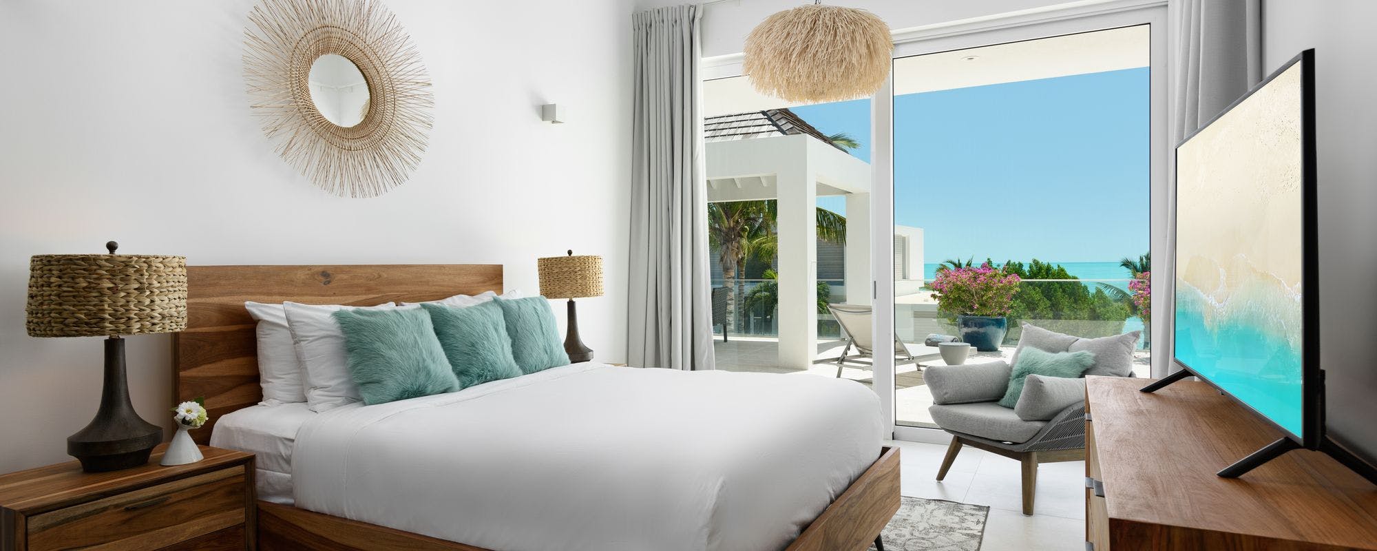Primary bedroom with a view in a Turks and Caicos vacation rental.