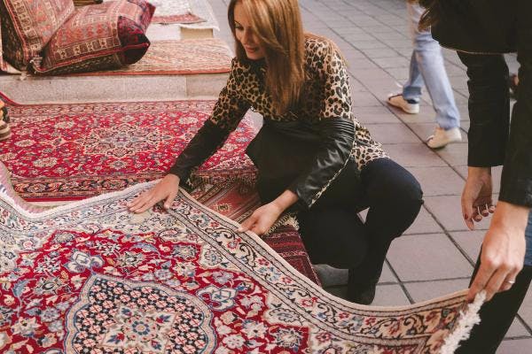 Woman buying carpet